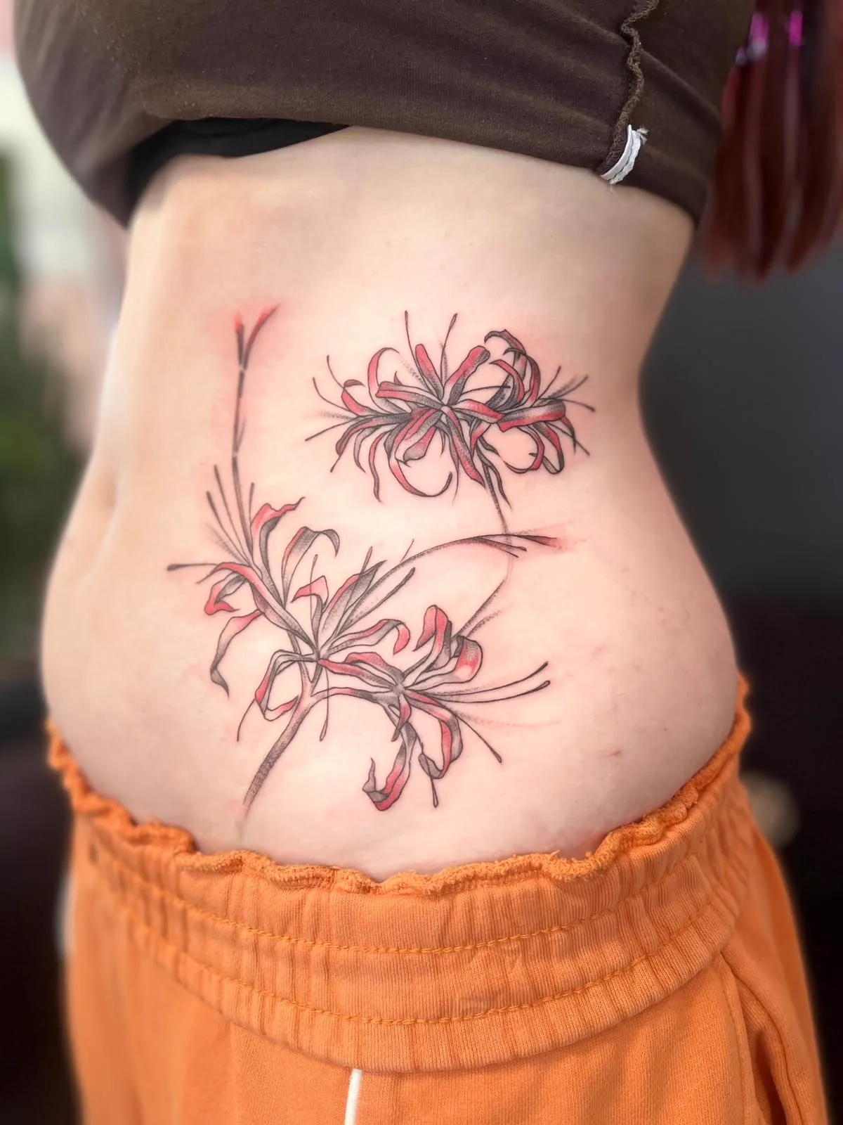 Spinnenlilien an der Hüfte